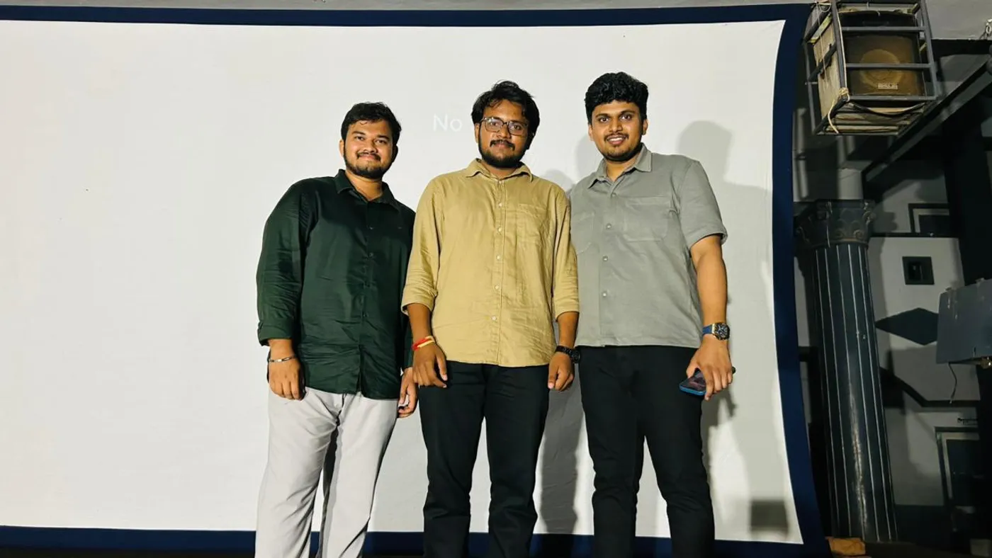 With the school chairman's son in front of the screen, at the end of event day